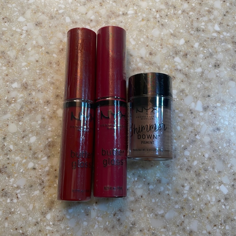 NWTs NYX two butter glosses and one shimmer down pigment